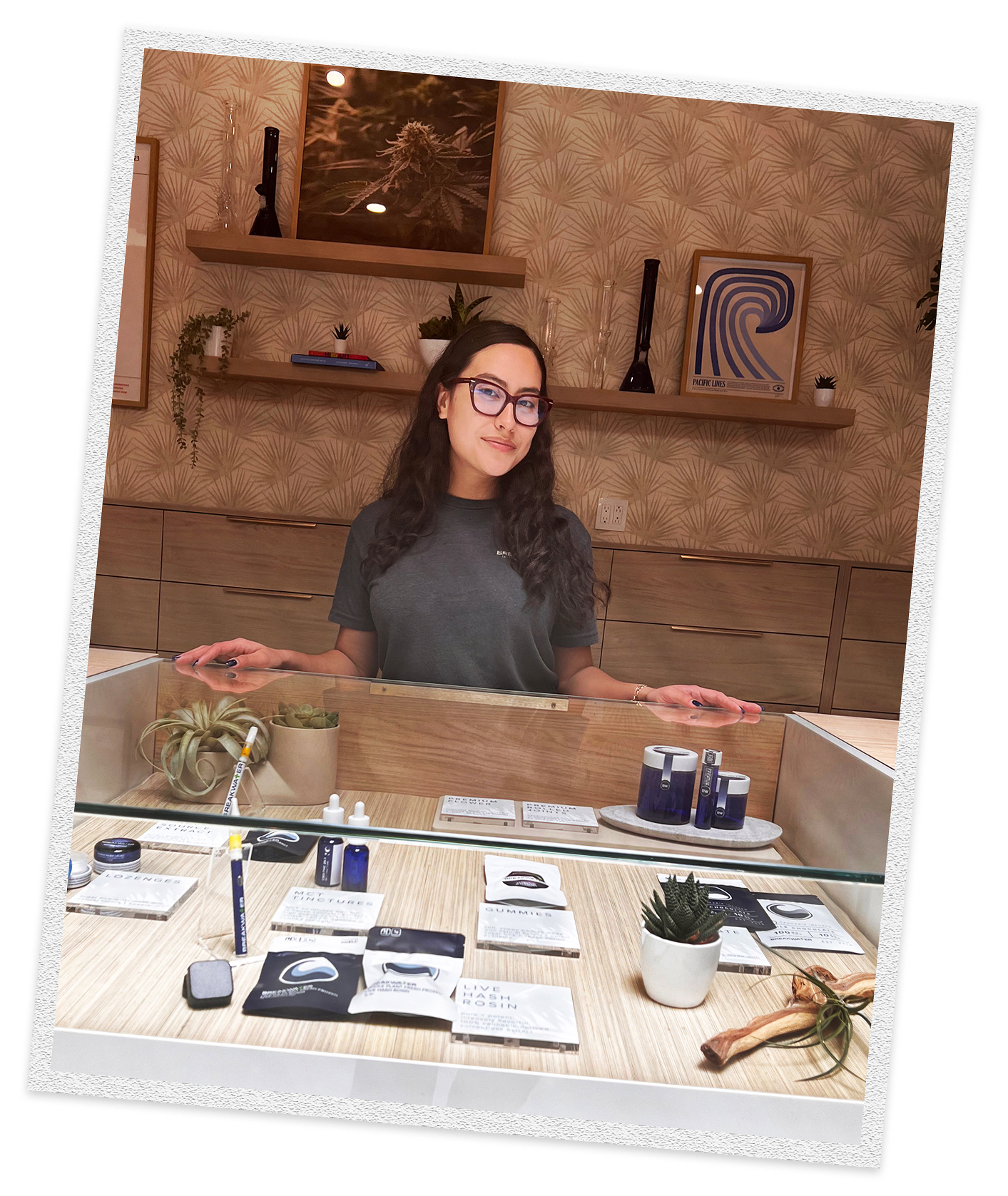 Budtender at dispensary counter