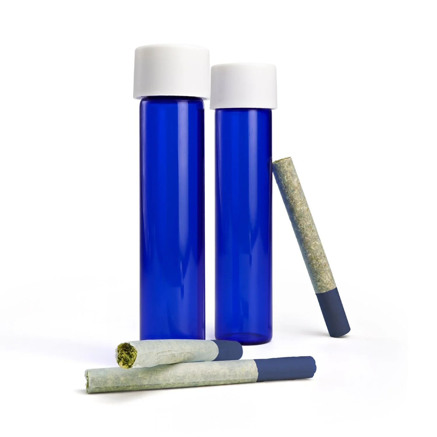Two blue glass joint jars side by side. One full gram joint and two half gram joints resting around jars.