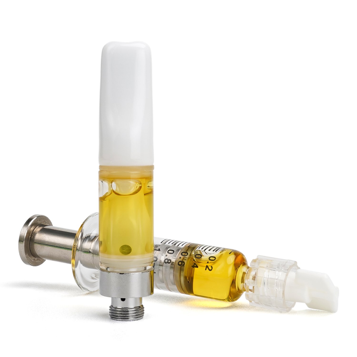 Cannabis extract cartridge and syringe dispenser together.