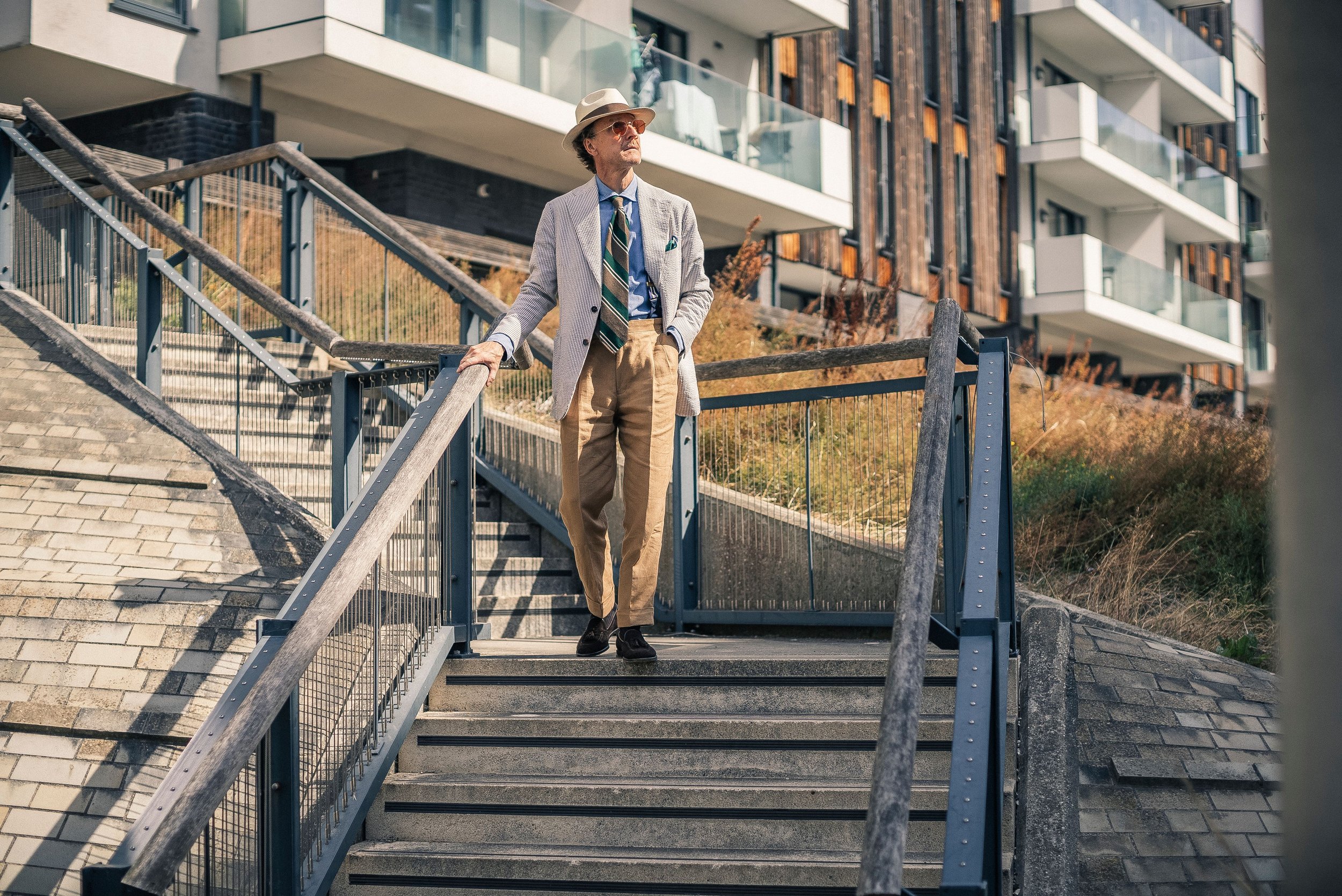 David wearing bespoke Seersucker stripe Jacket and Linen double pleat bespoke trousers.