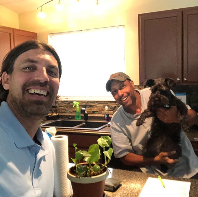 This picture was taken immediately after the closing that took place in the kitchen, with a very excited Evie the dog. After the title agent left, I asked Darren how he felt. I believe his exact words were &quot;I can't stop smiling, and I realize no