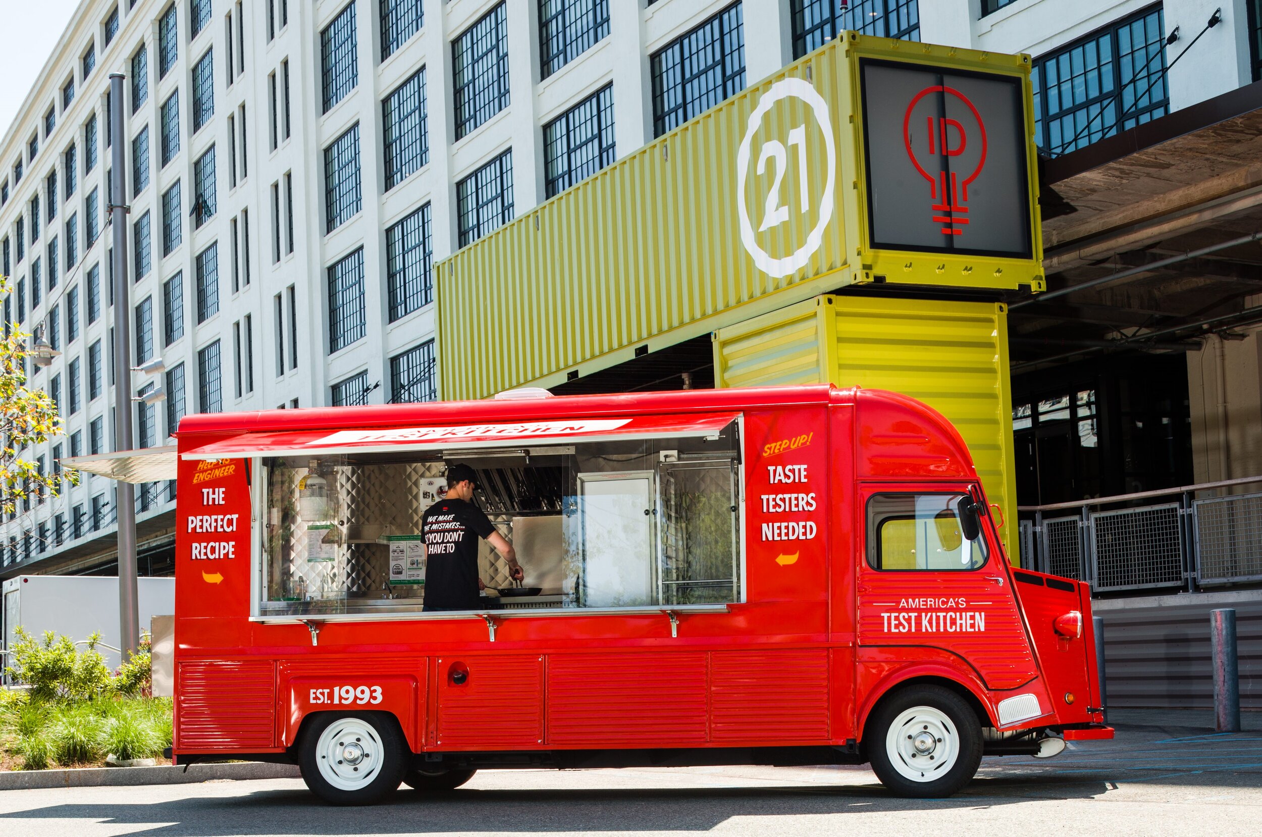 America's Test Kitchen food truck parked in front of building