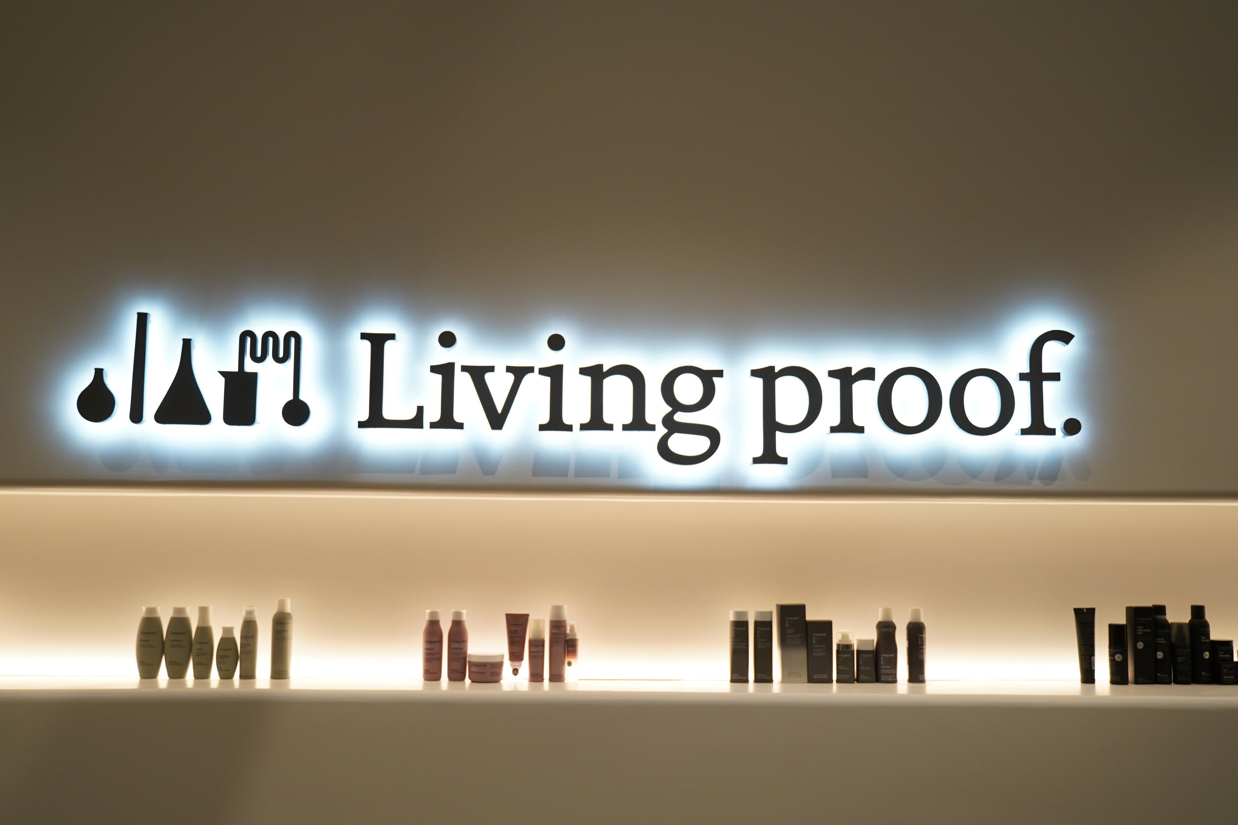 Living Proof office sign illuminated