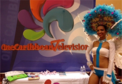 One Caribbean Television's festive exhibitor booth.