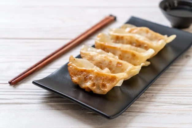 japanese-gyoza-dumplings-snack_1339-12264.jpg
