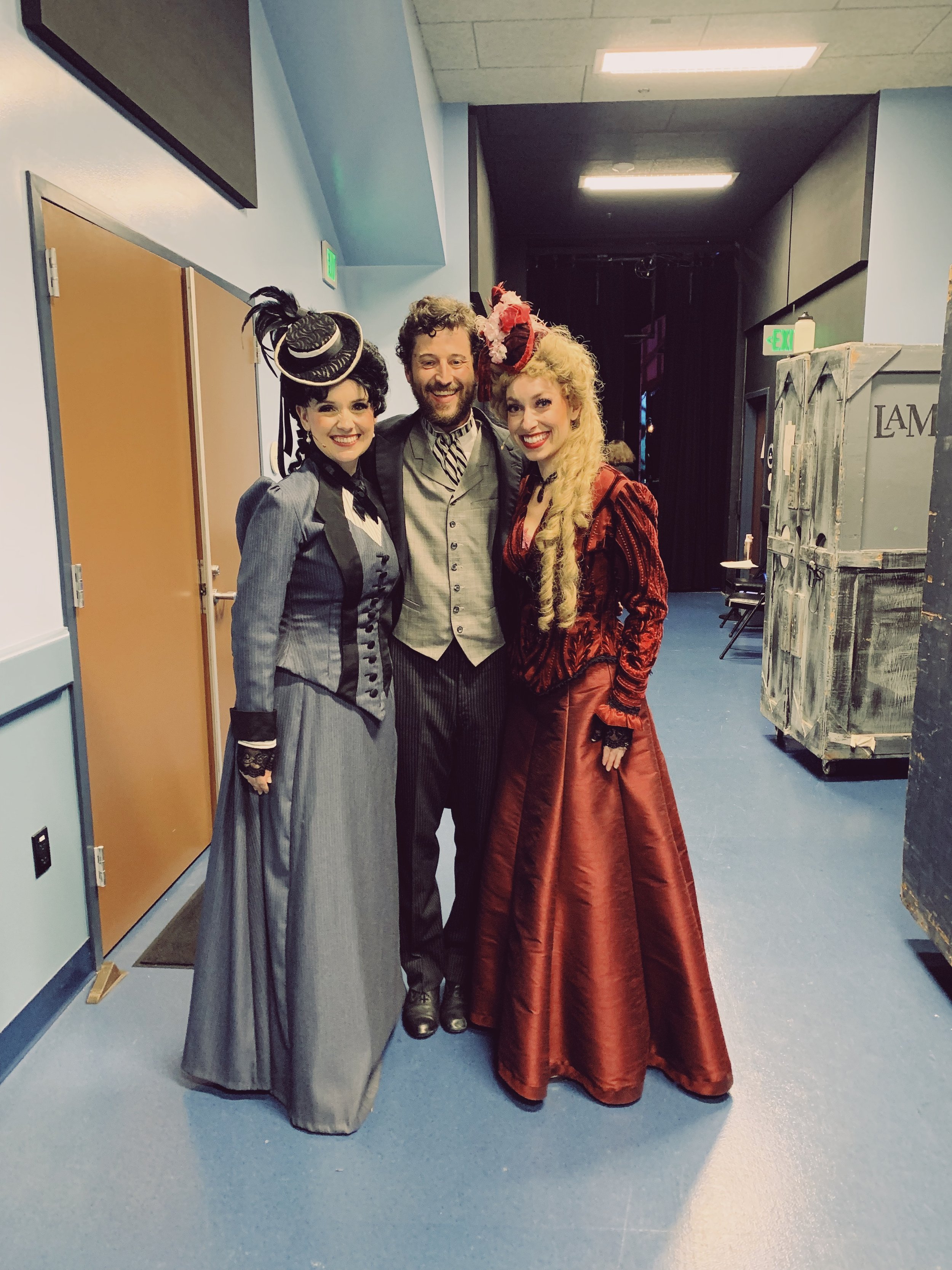  Leslie wearing red dress with two castmates of  A Gentleman's Guide to Love and Murder.  