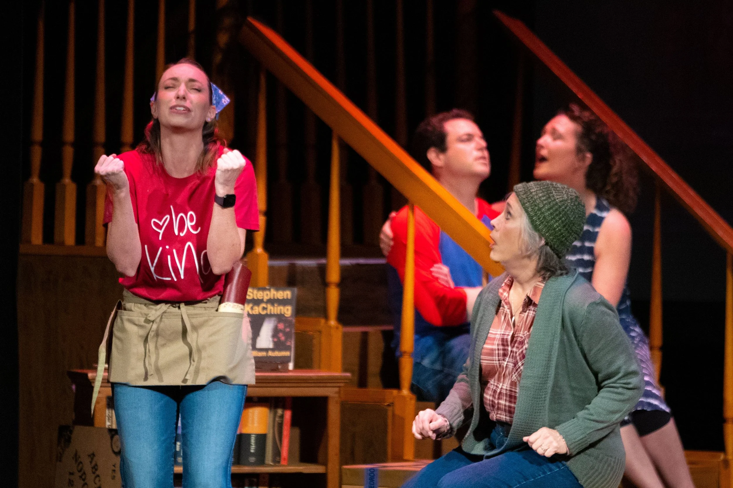  Leslie as Carrie, wearing red tee shirt, jeans, and blue handkerchief, in  Choirstarter  with Lamplighters Music Theatre, pictured with castmates. Photo by Joe Giammarco. 