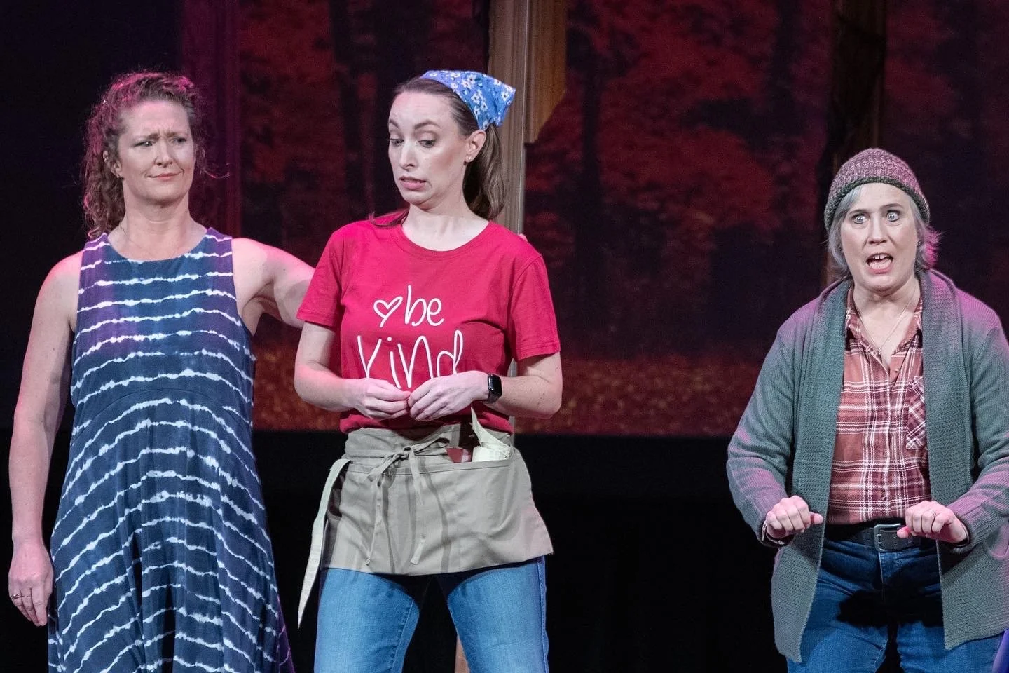  Leslie as Carrie ,  wearing red tee shirt, jeans, and blue handkerchief ,  in  Choirstarter  with Lamplighters Music Theatre, pictured with castmates. Photo by Joe Giammarco. 