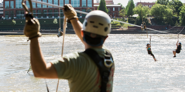 Zip lining above a river
