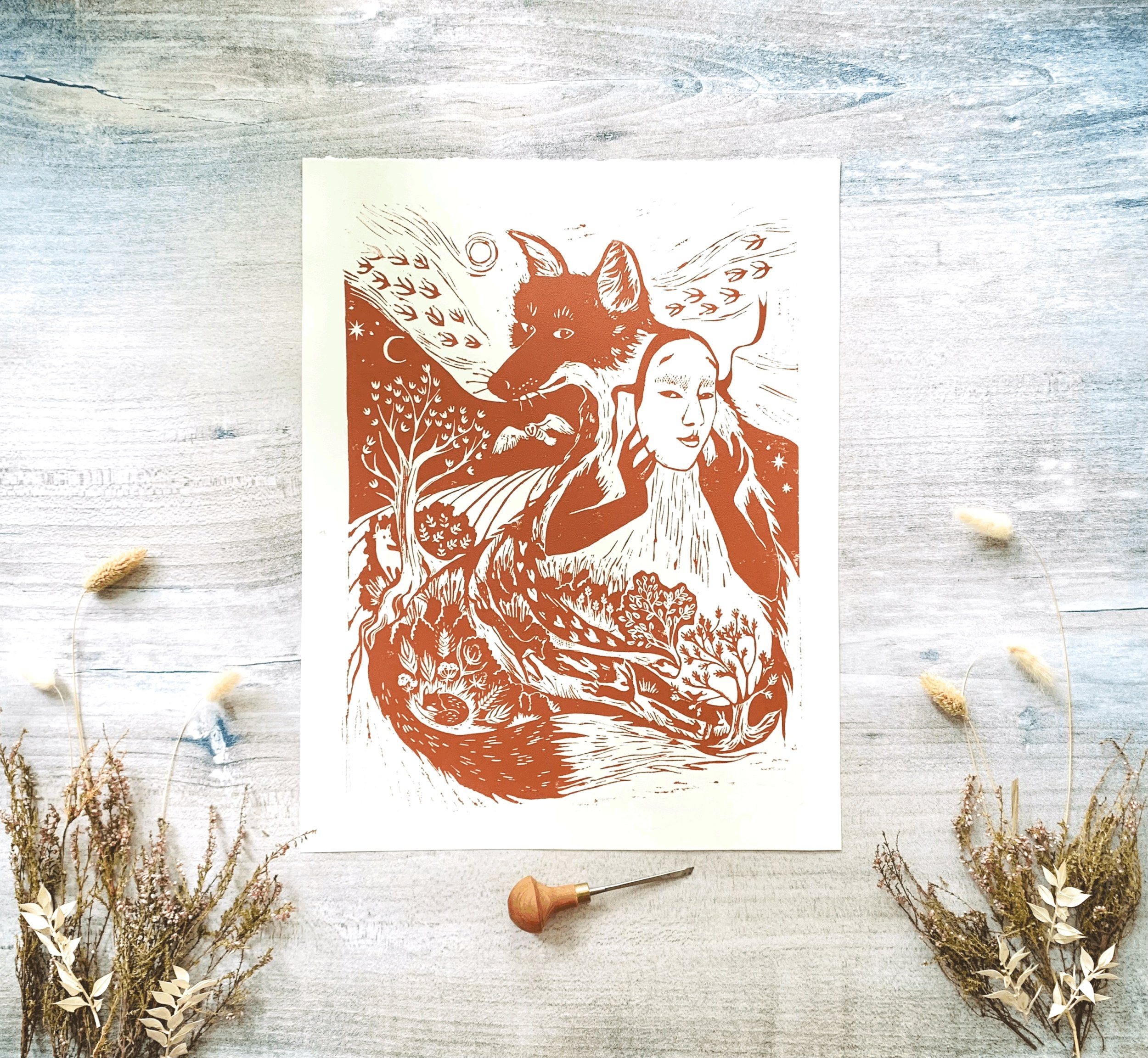 A handmade linocut of Kitsune, Fox Woman from Japanese folklore