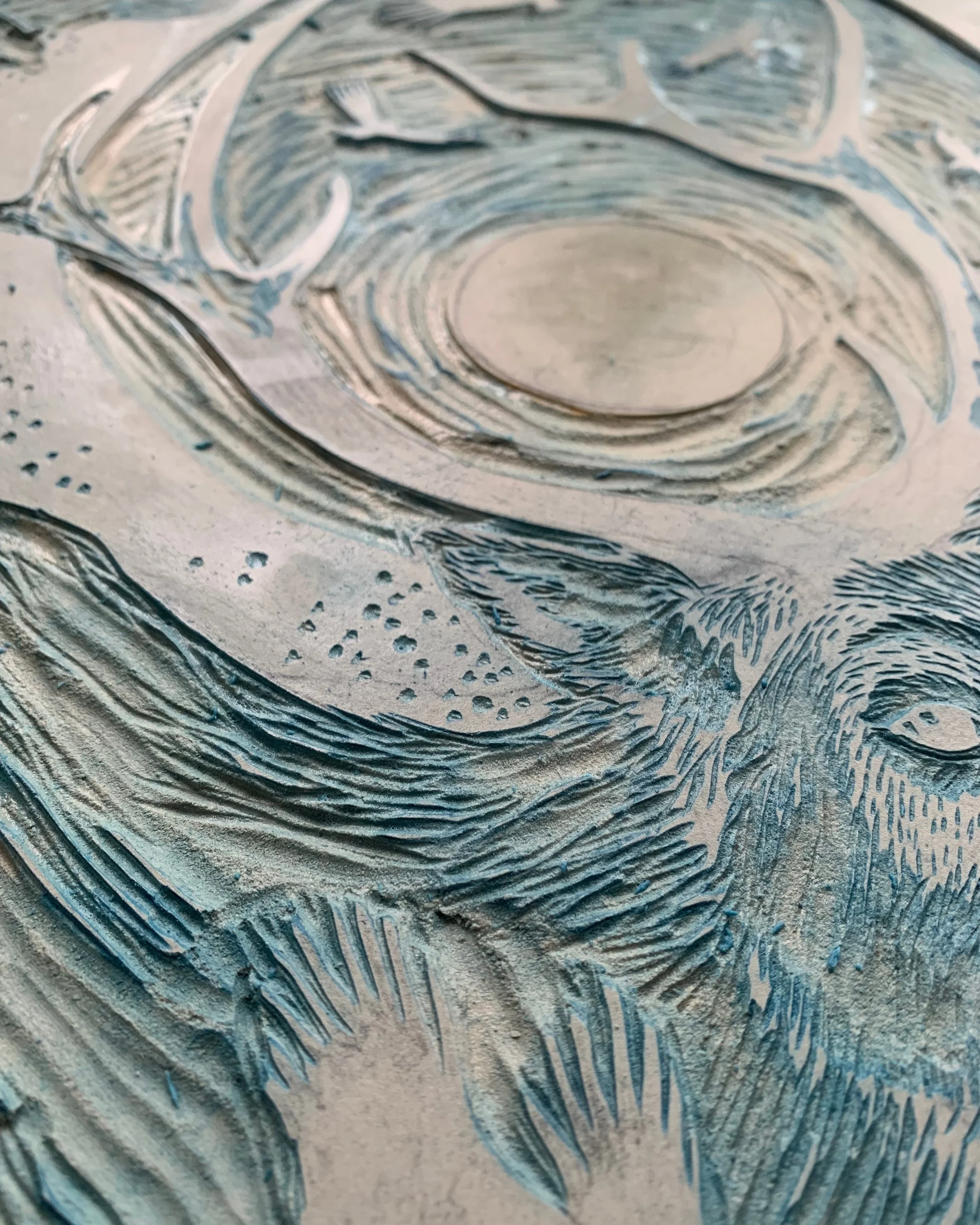 Sun Beings carving close up 2.jpg