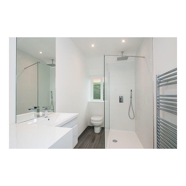 This bathroom was part of a full in-house acquisition, design &amp; build on a whole bungalow. Swipe 👉🏽 for a before &amp; during. .
We kept this room simple, crisp &amp; fresh. Some contrasting plank floor tiles from @tileandfloor_ &amp; simple ma