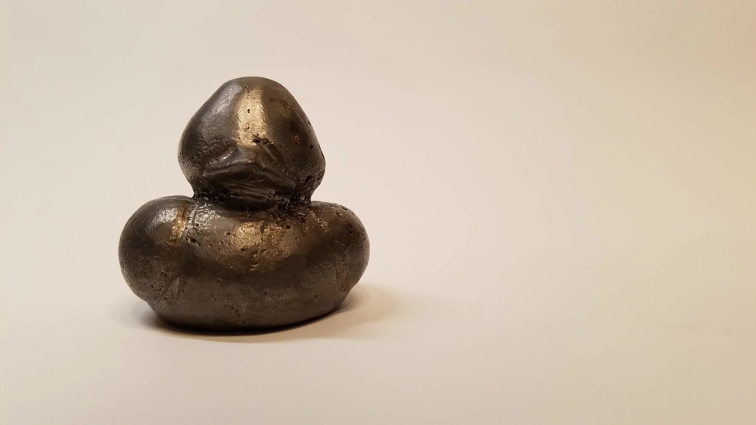   Dada  sculpture of a rubber duck made of solid iron 