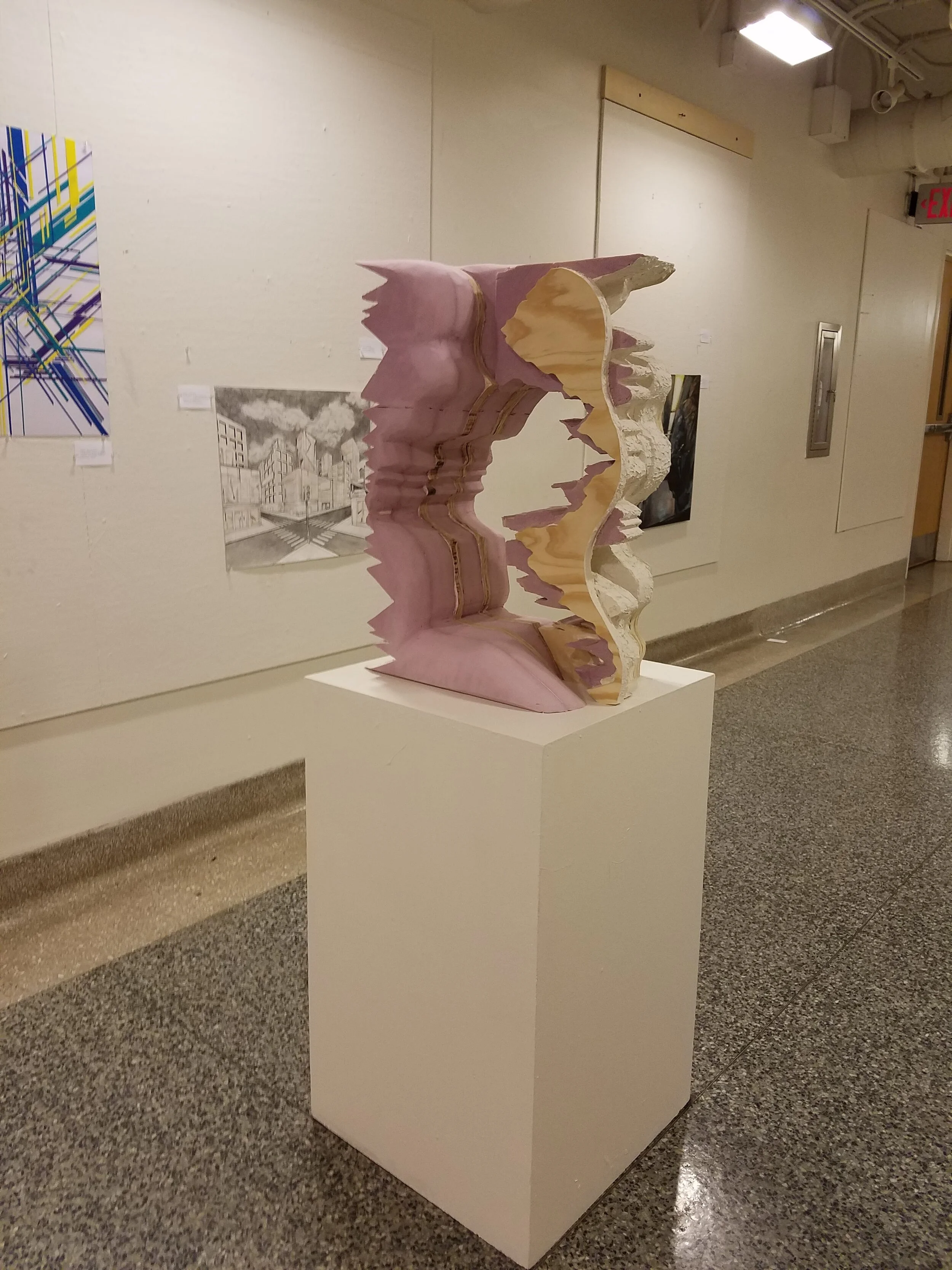   Mixed media sculpture of the fusion of natural and planned creation 