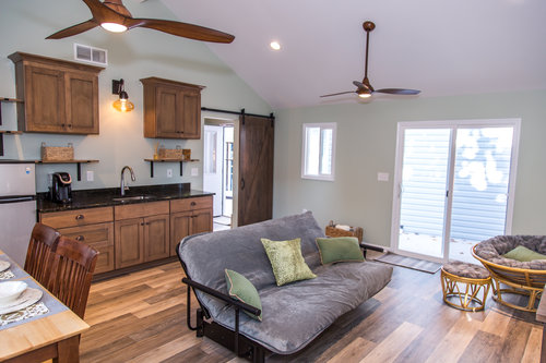 This is a photo of the completed remodel of the same detached garage shown in the above before shot and 3D rendering. What a transformation! You can read the full story on this remodeling project here.