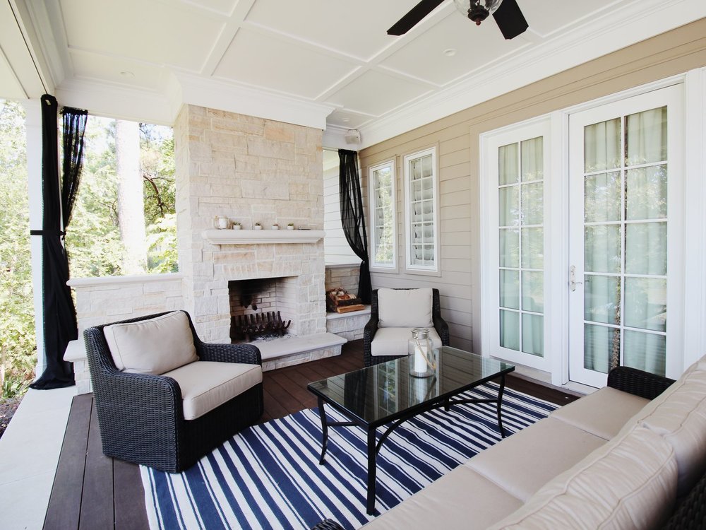 Bright-Coastal-Porch-Fireplace