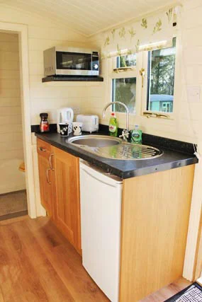 shepherds-hut-glamping-rookery-farm-broadway-kitchen-w.jpg
