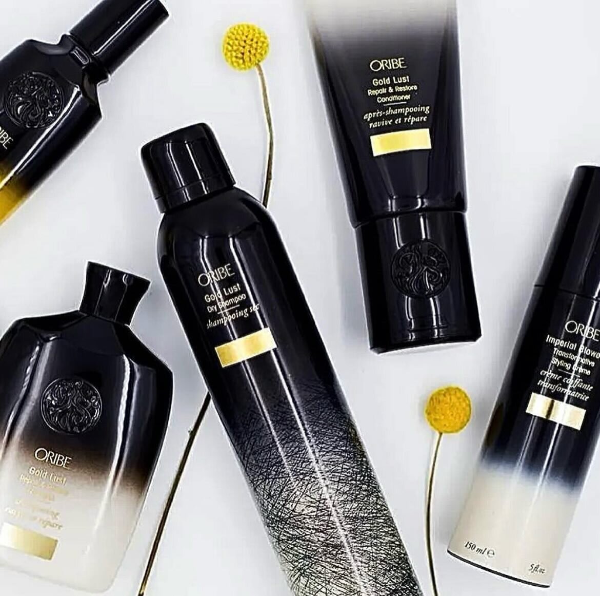 🌟Stock up with some of our @oribe favorites! The Gold Lust products are Oribes richest line. Rejuvenate your scalp with their shampoo &amp; conditioner, keeping your hair healthy and nourished with their styling products! 🌟