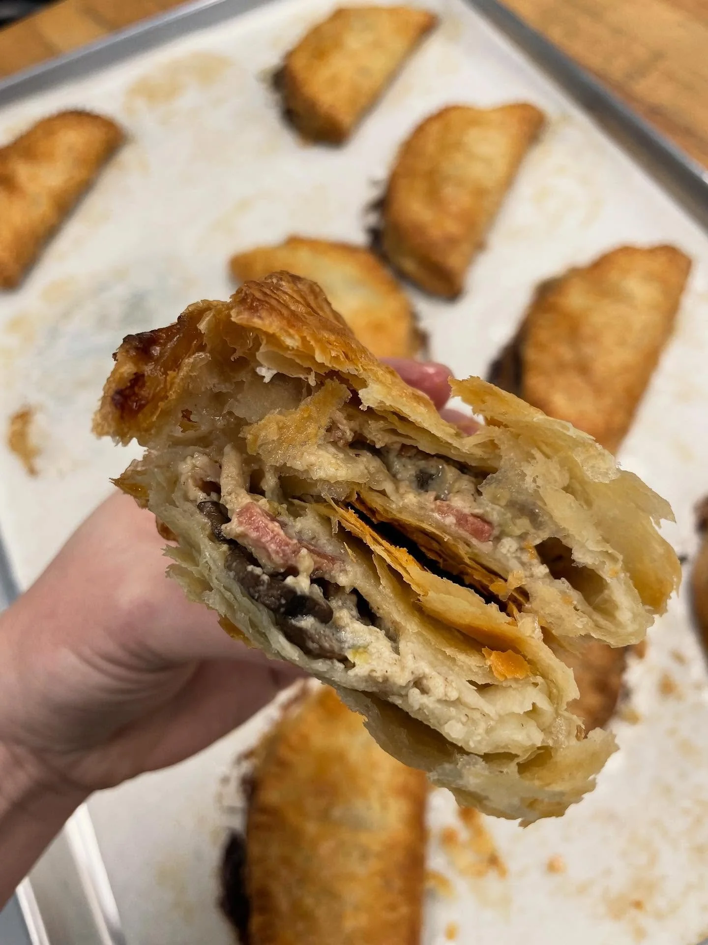 Pardon the interruption but the Bacon Mushroom Hand Pie is back! Bacon roasted mushrooms and crispy bacon come together with a green chili gravy in a little to go pie snack that&rsquo;s been a crowd pleaser for a while. Available at the bakery! 
Here