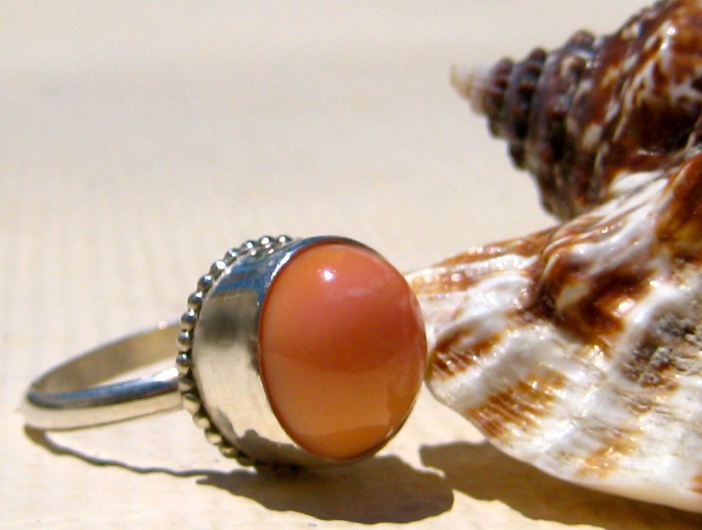 An old favorite 🐚 This is a real queen conch pearl! By far the biggest one I&rsquo;ve ever seen. I had the privilege of building a simple silver setting for it well over a decade ago back in Rum Cay, Bahamas. This is one of the few pieces that I mad