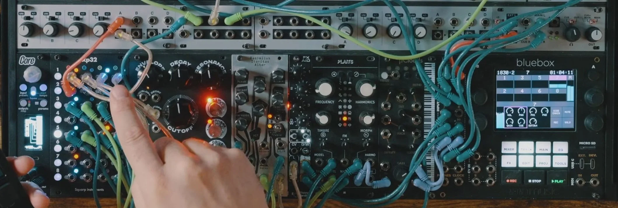Squarp CORE and XP32 patched to Plaits and other Eurorack voices during the envelope demonstration.