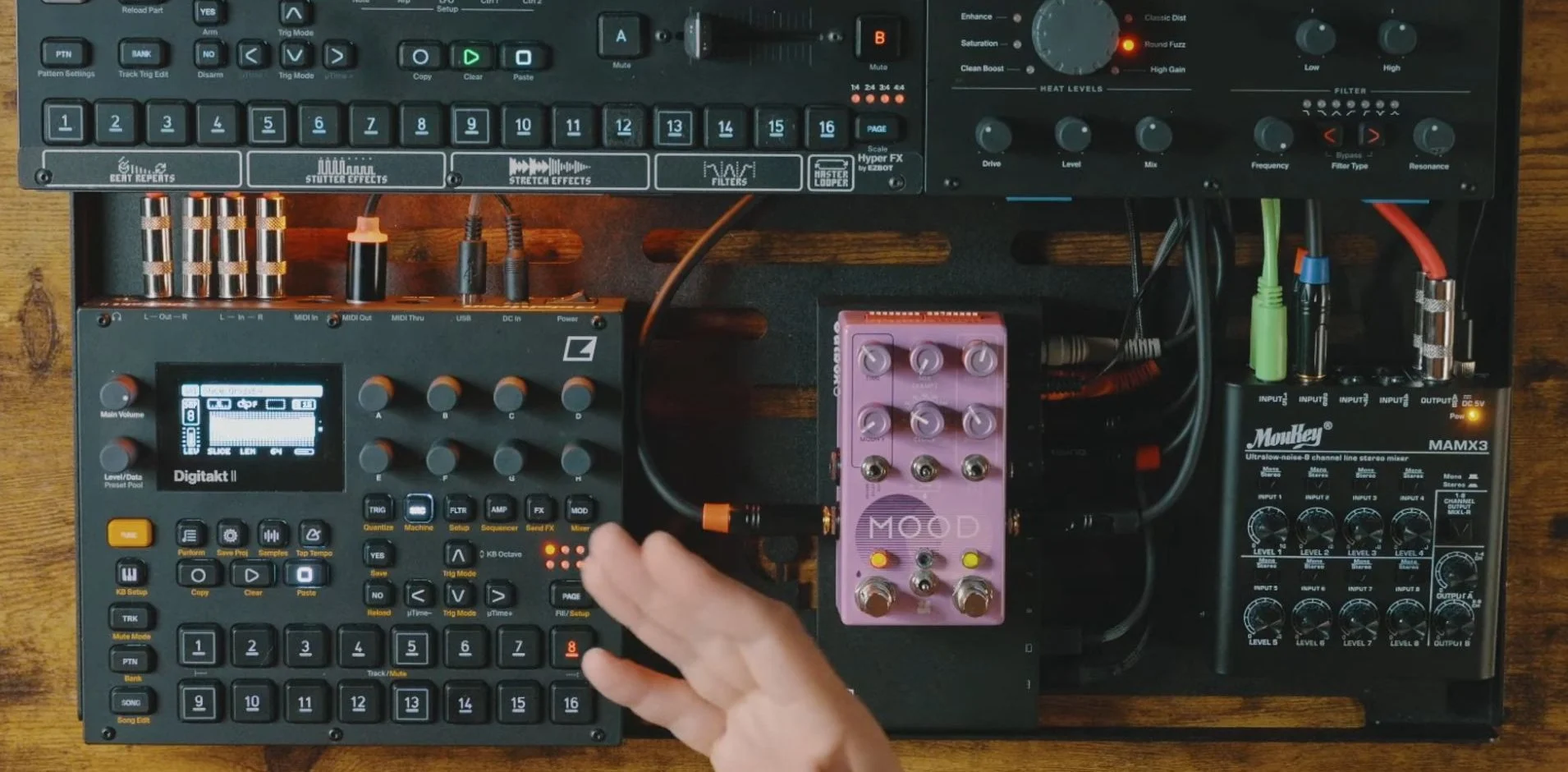 Digitakt II showing a single-cycle grid waveform, with MOOD MKII and a compact mixer connected for external processing.