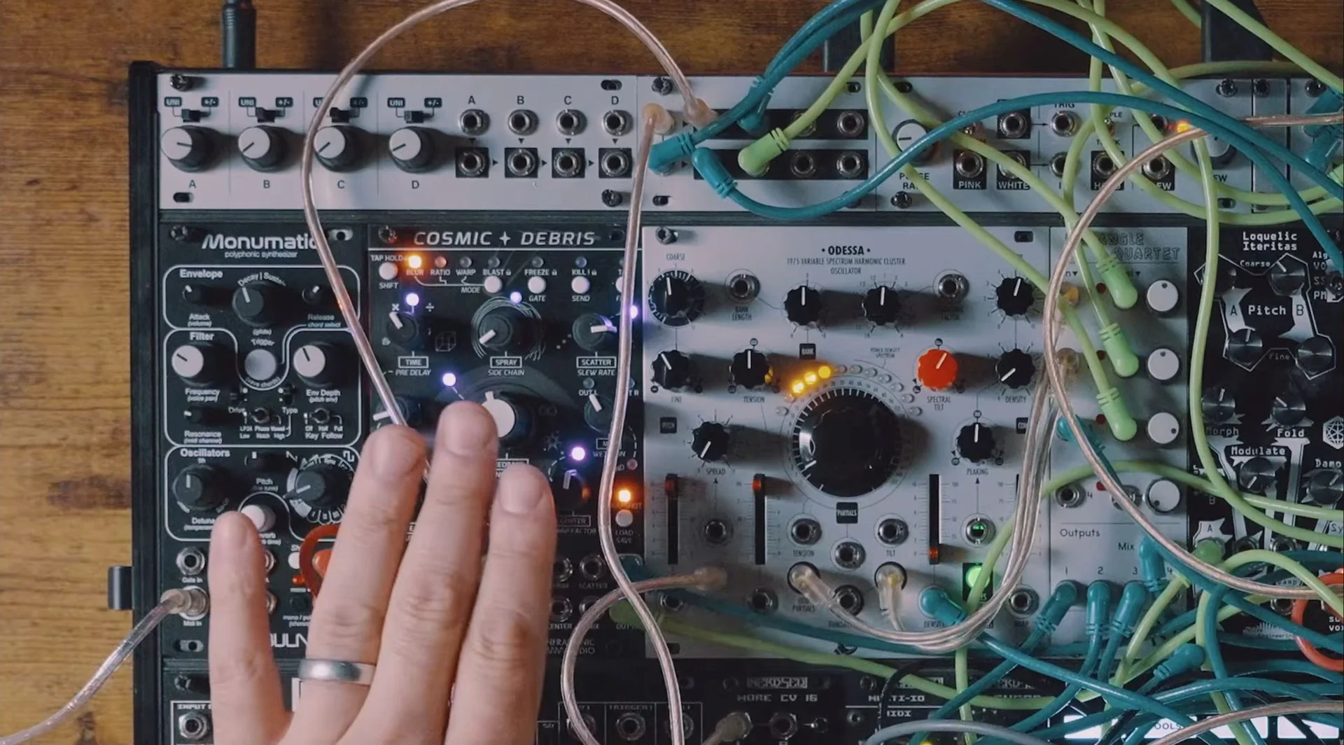 Knobula Monumatic, WMD Cosmic Debris, Xaoc Odessa and neighboring patched voices in the modular dub-techno case.