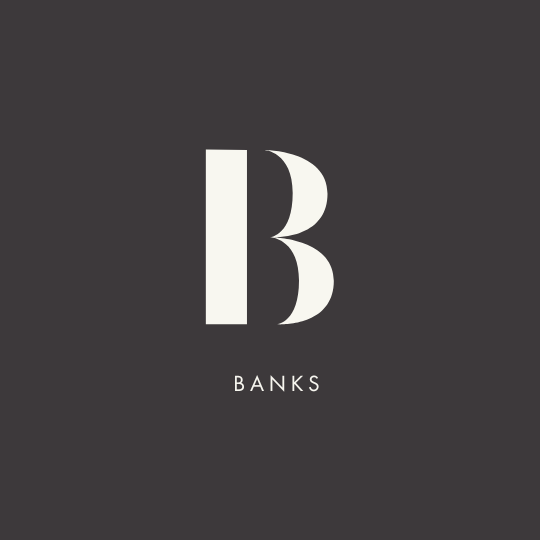 A dark gray background with a large stylized letter B and the word BANKS written below it.