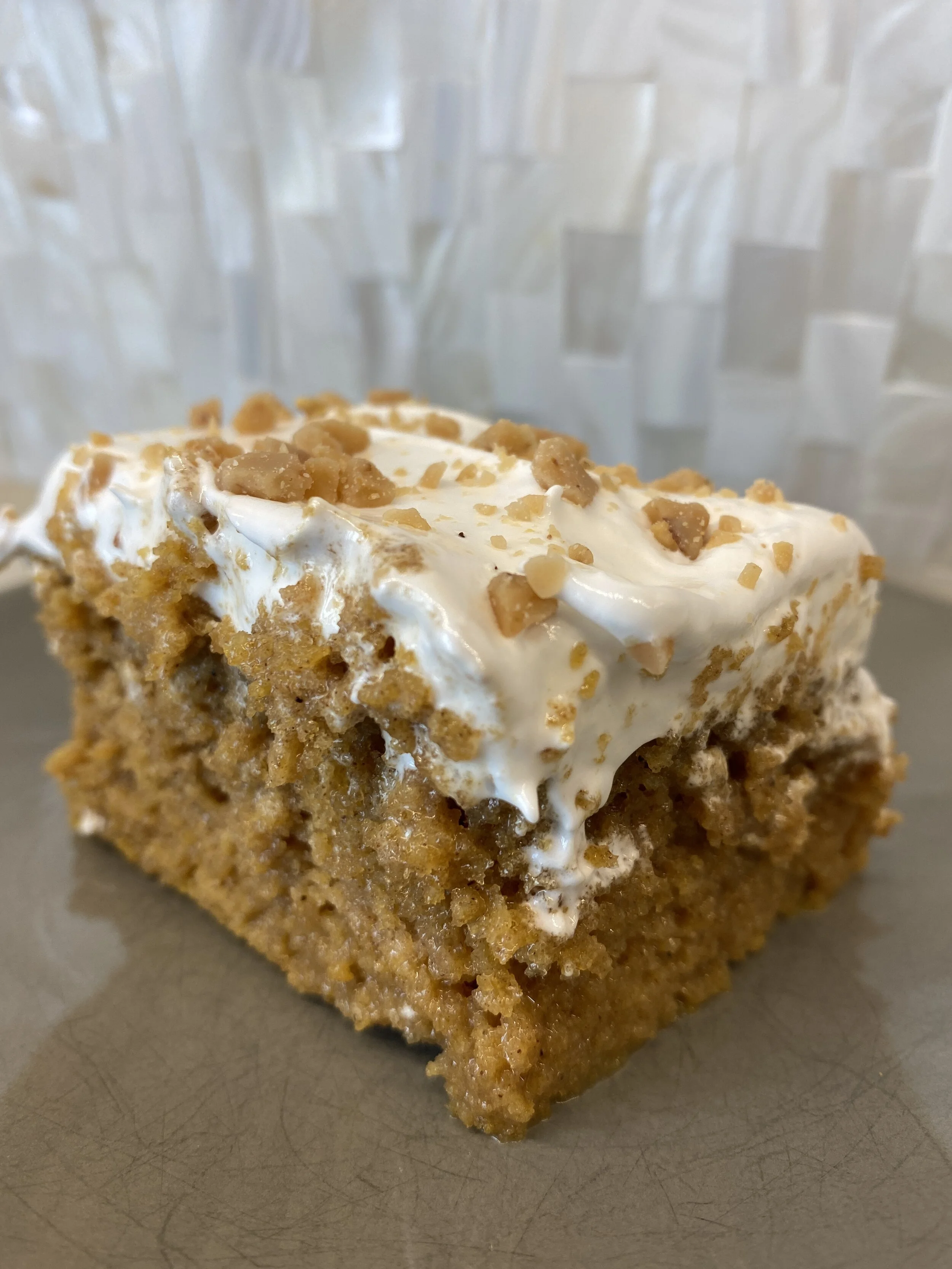 Caramel Pumpkin Poke Cake with Marshmallow Frosting