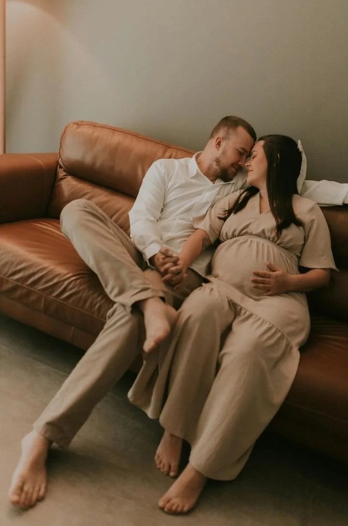 partner snuggles in early labor