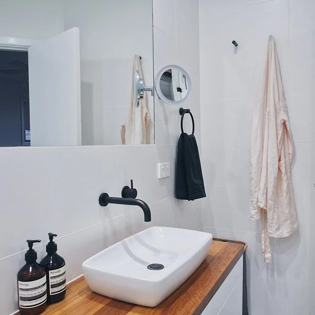 Thoughtful detail creating harmony in upstairs and downstairs bathrooms. #kathrynburrowsdesign