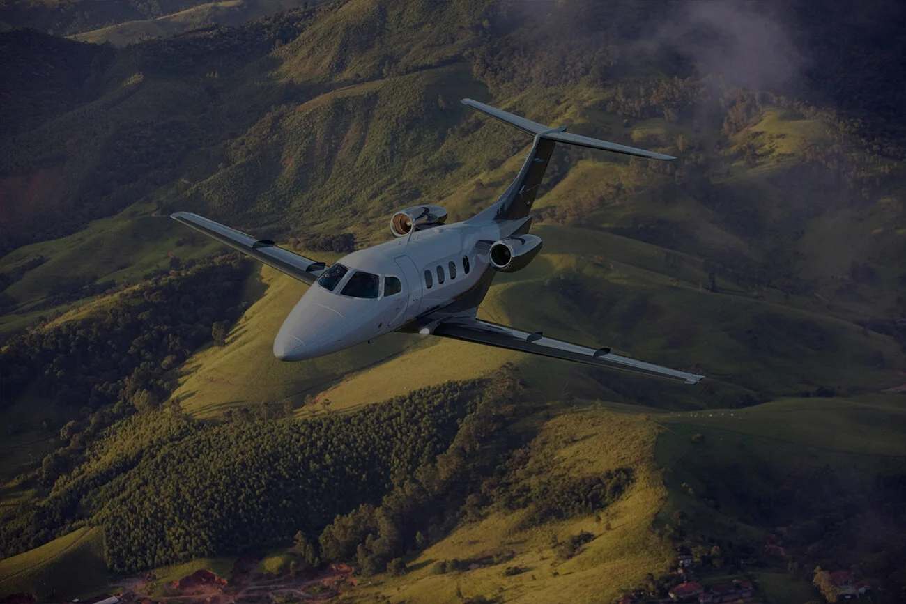 Embraer-Phenom-100E-3 - edit.jpg