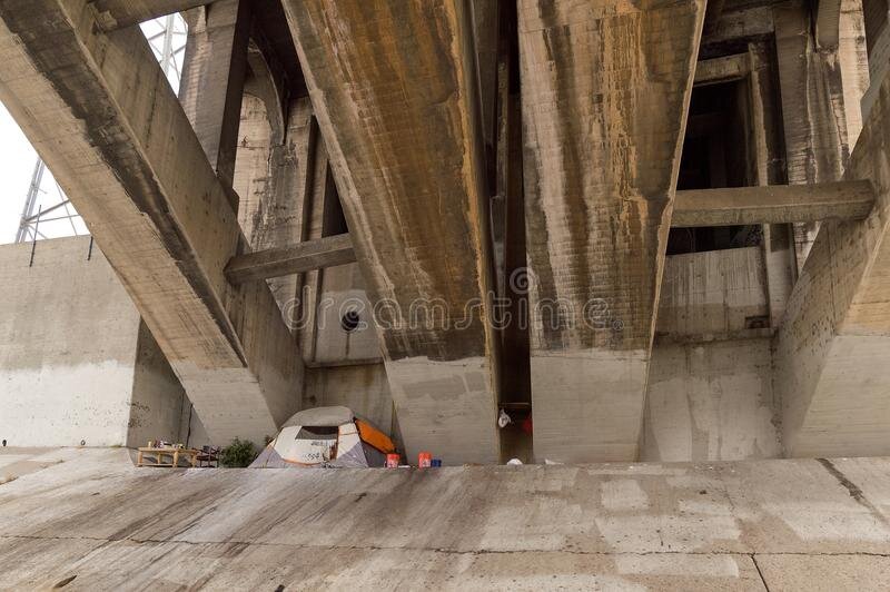 homeless-encampment-under-bridge-los-angeles-tent-other-belongings-person-over-river-dtla-region-has-tens-101195131.jpg