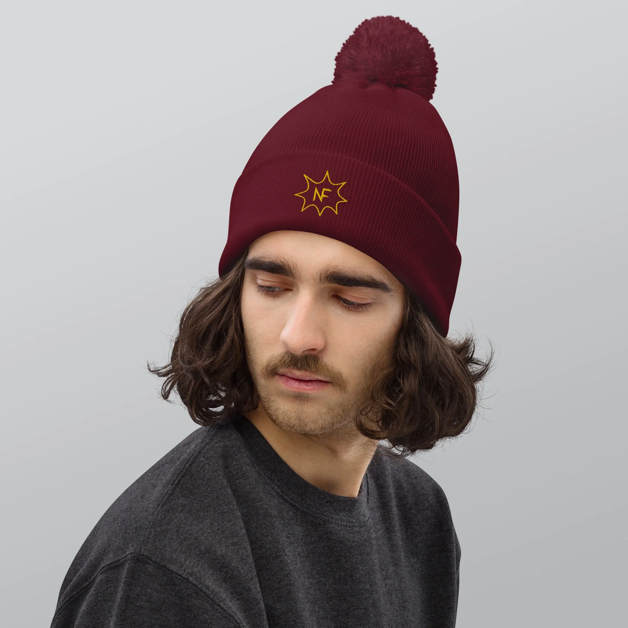 pom-pom-beanie-burgundy-front-6560ca520b91d.jpg