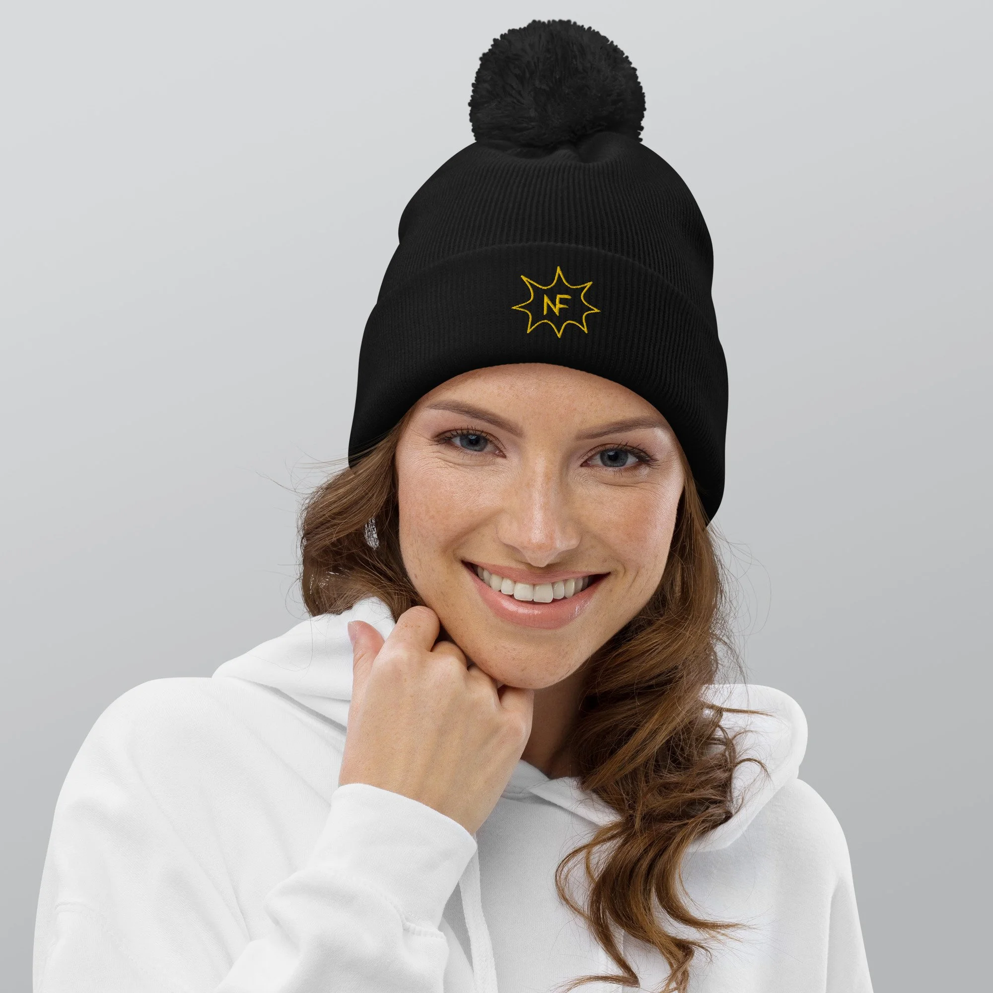 pom-pom-beanie-black-front-6560ca520bb92.jpg