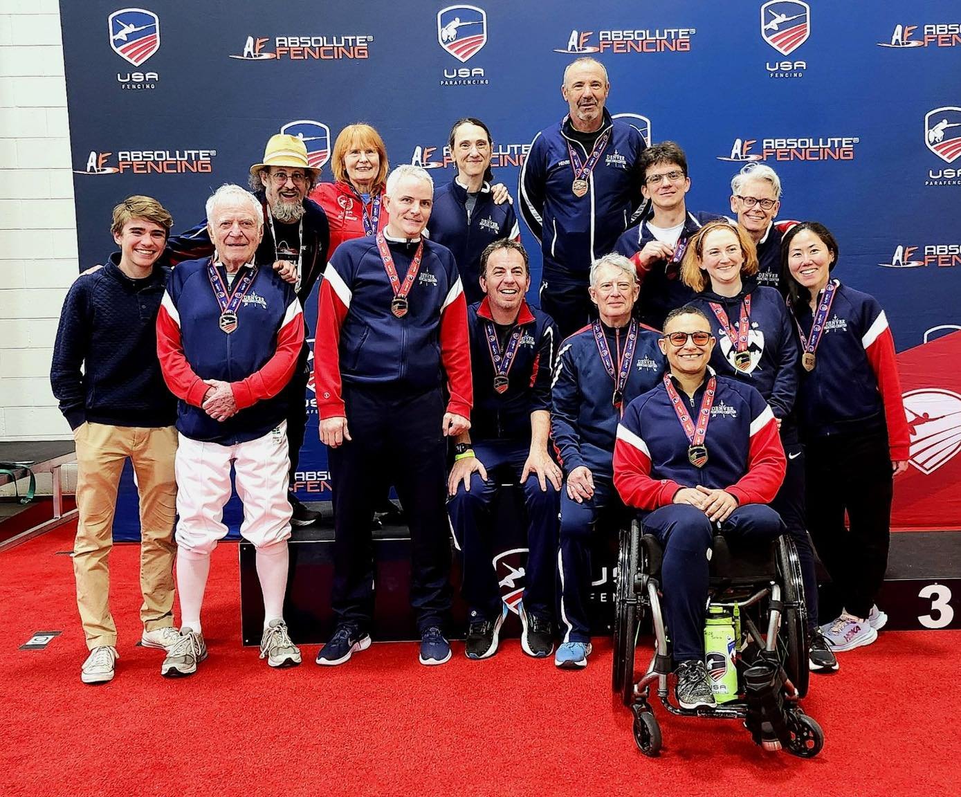 Historic Day: 12 Medals today!  We tried to get all of the medalists and supporters in one photo.  We miss a couple of people.  Congratulations:
Gold/National Champion: Jataya Taylor - Para Women&rsquo;s Foil
Gold - Tom Lutton - Vet 70 Men&rsquo;s Fo
