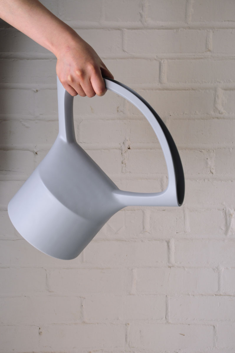   Symmetrican by Saebyul Lim  The symmetric apertures on this watering can allow it to be approached from either side. The handle doubles as a sort of funnel, directing the water into the container naturally. 