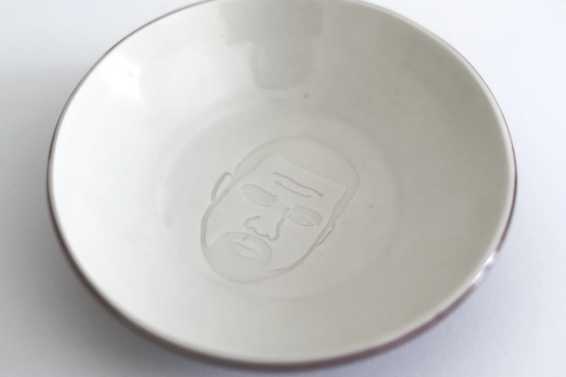For an art show in 2016, I made 25 custom Kanye Bowls. Each bowl is porcelain with silkscreened underglaze. 