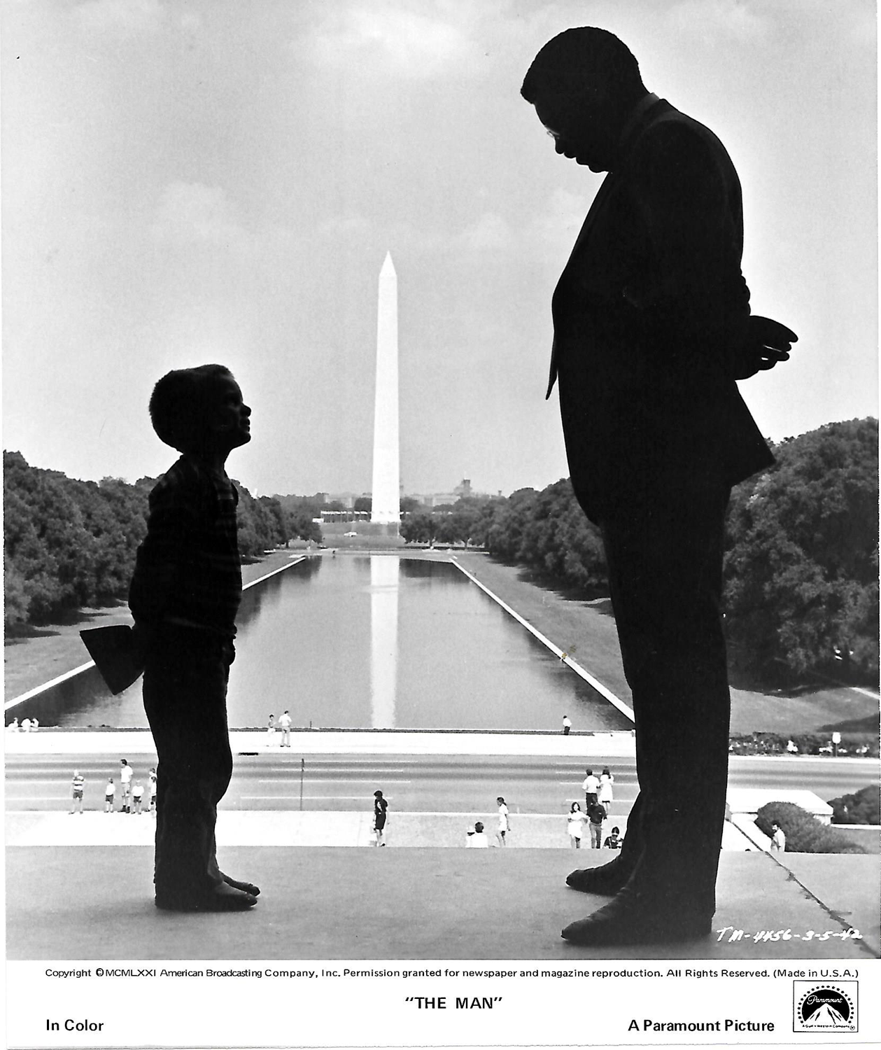  A little boy looks up at President Dilman (James Earl Jones). 