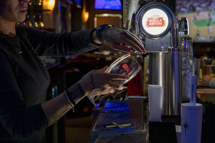 Pouring a draft beer at City Tap