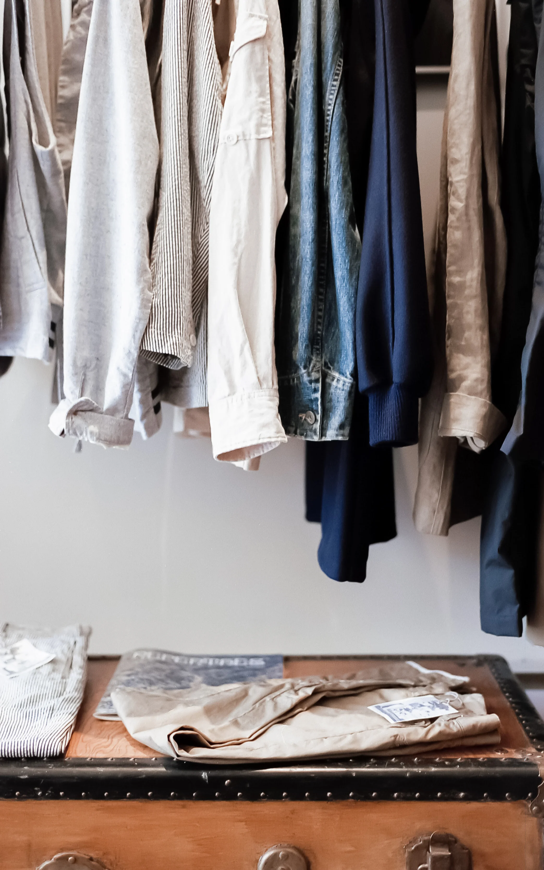 maternity clothes hanging on rail