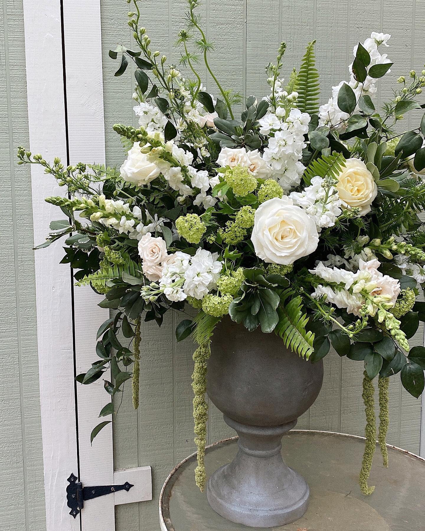 the inspiration for this urn arrangement (and wedding design as a whole) was rooted in southern grandeur, but with the air of being a bit overgrown, as if the flowers had been planted a little while ago and left to grow just a touch wild. We added ha
