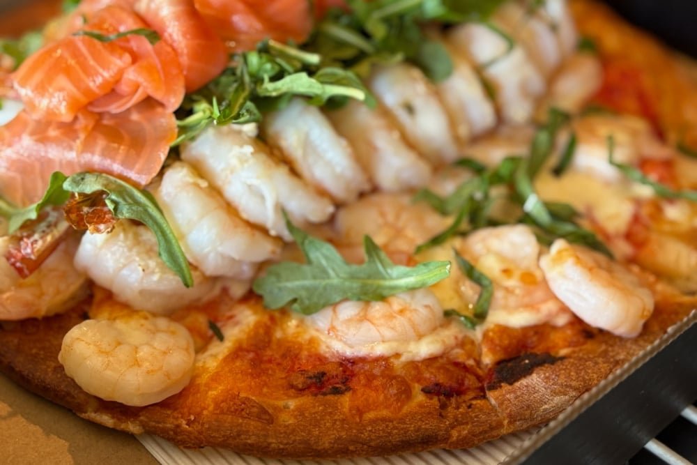 Around the World in 8 Slices: Global Flavours That Inspire Our Pizzas