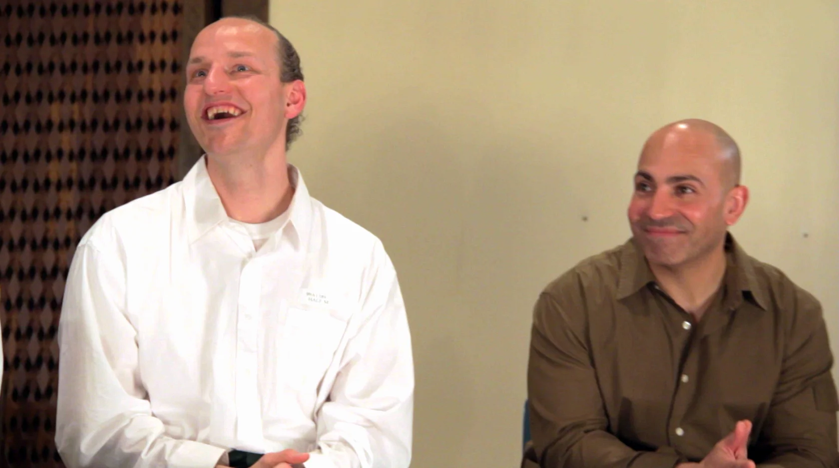 Shane and De react to a question from the audience following the performance.