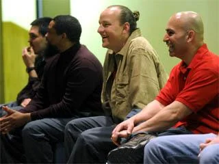 From left, Auburn Correctional Facility inmates David Bendezu, Kenneth Brown, Michael Shane Hale and Efraim Diaz respond to questions after their performance at the prison. The inmates performed personal stories with tones of humor and personal hurting as part of the Phoenix Players Theatre Group. Katie Roupe / The Citizen
