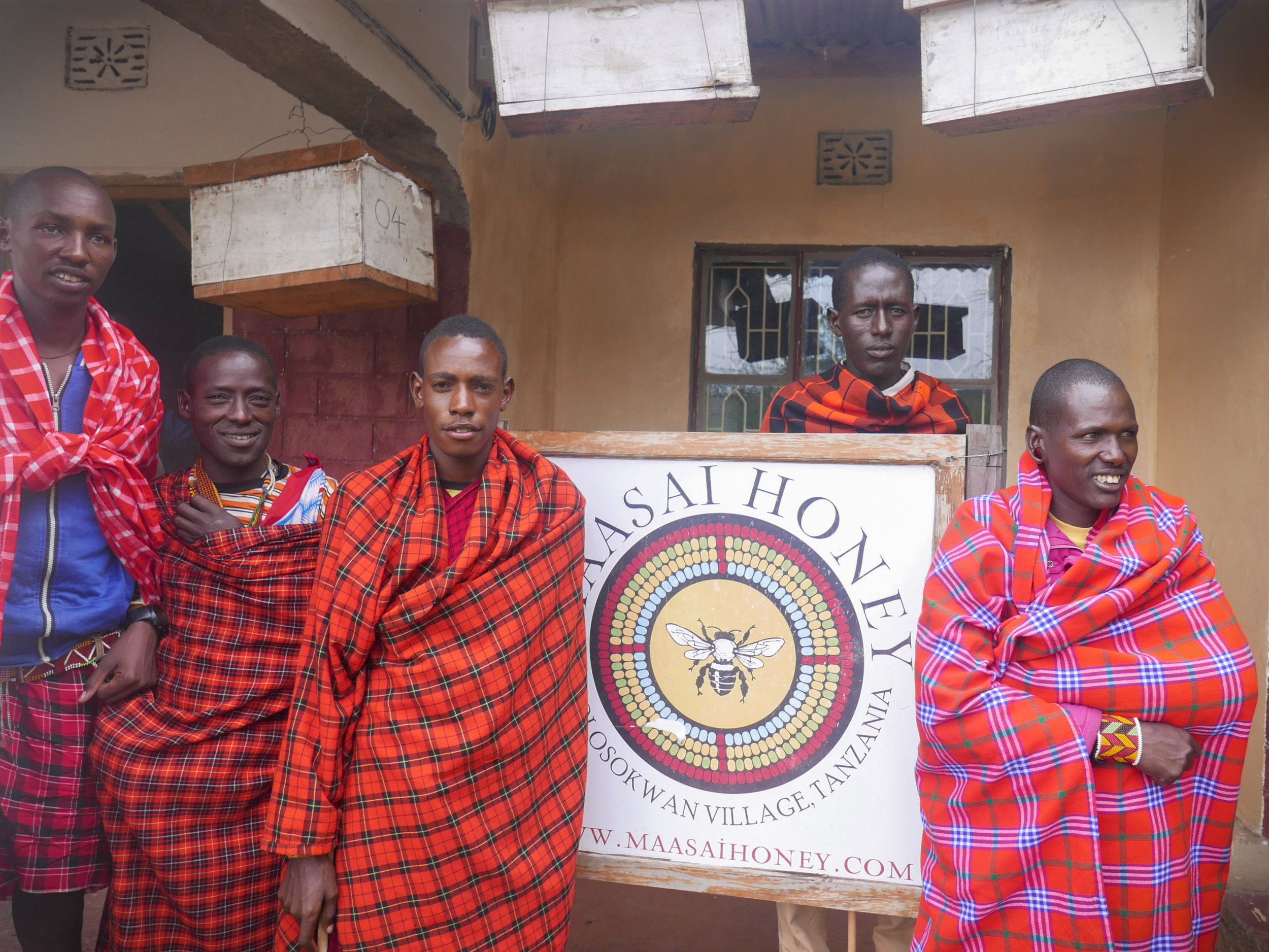 Maasai Honey apiary guards at our office where the stingless beehives are hung.