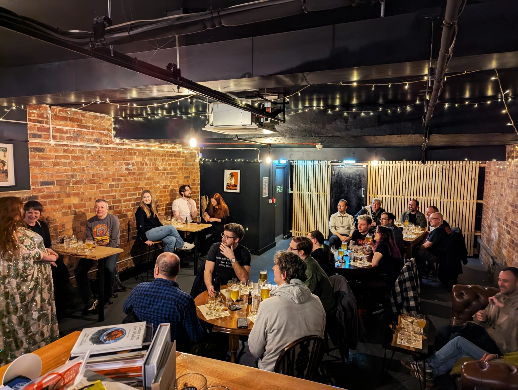 Guests at HopScotch Whisky Bar in Liverpool enjoying a whisky tasting hosted independent whisky bottler, Fragrant Drops.