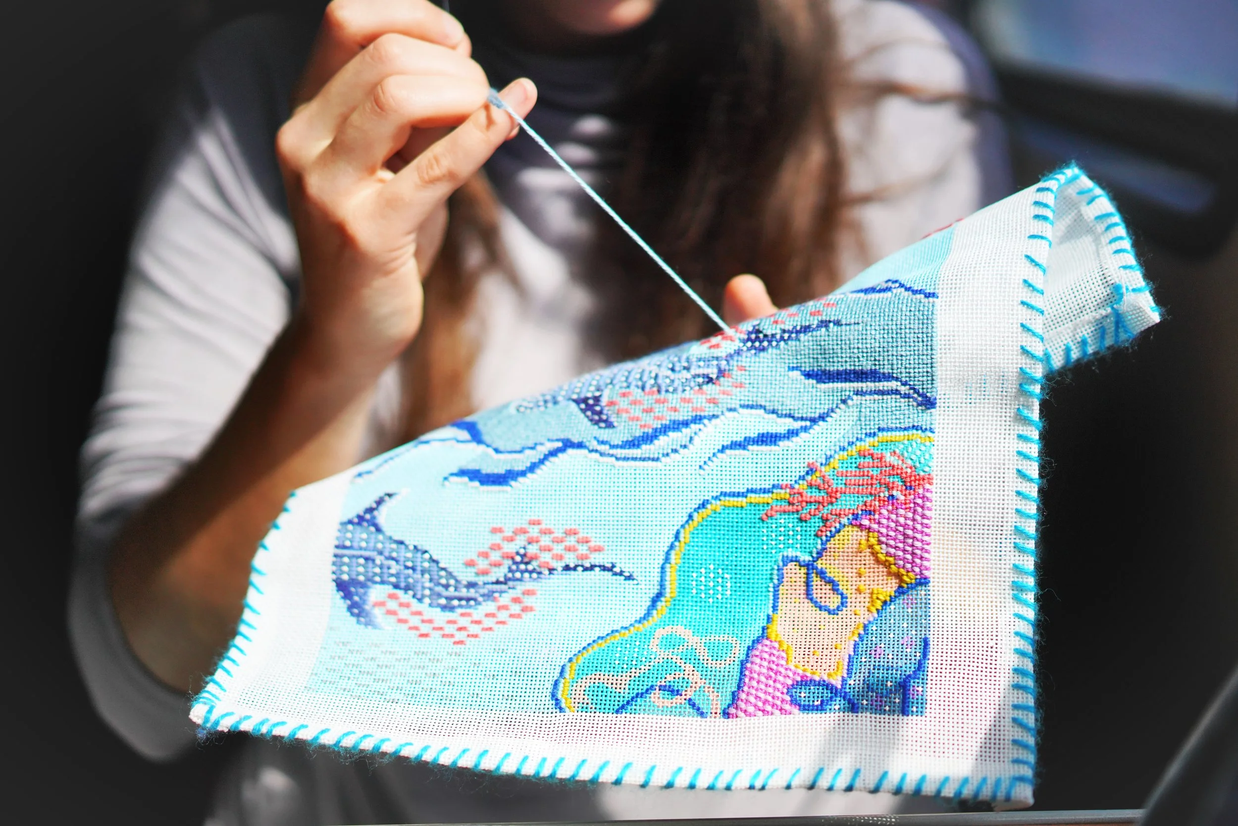 Stitching On The Ferry.JPG