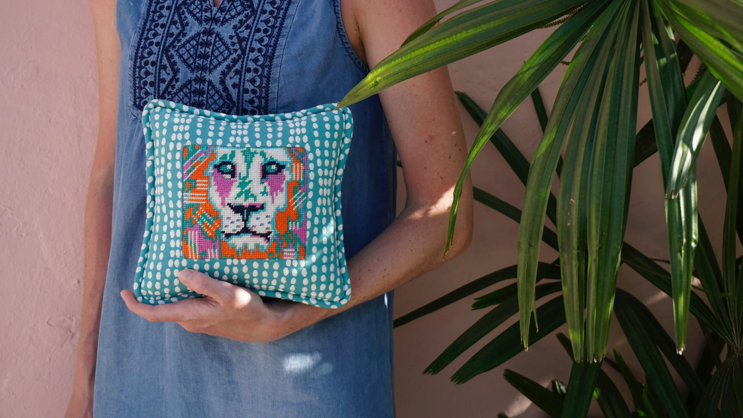 The first Leo The Lion I stitched held by Tess of Hello Tess Designs