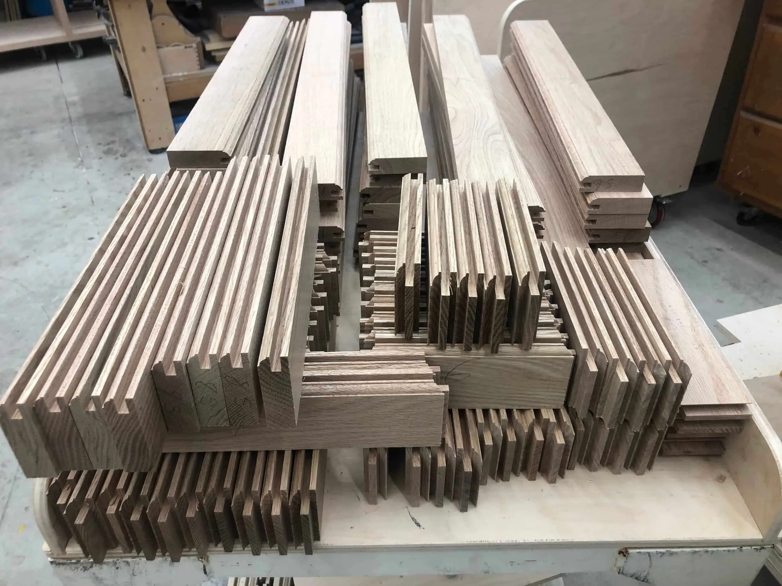 Premium solid hardwood cherry maple and oak lumber with furniture-grade plywood for custom cabinet construction